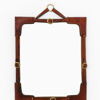 Mirror in leather and brass at Studio Schalling