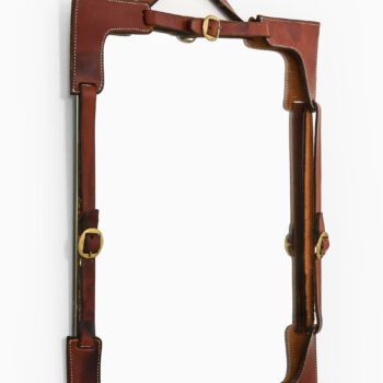 Mirror in leather and brass at Studio Schalling