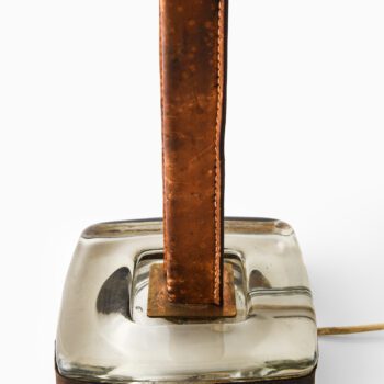 Böhlmarks table lamp in glass and leather at Studio Schalling