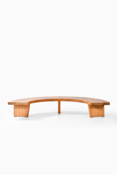 Large and curved bench in solid pine at Studio Schalling