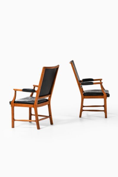 Erik Chambert armchairs in mahogany at Studio Schalling