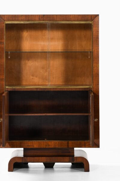 Bar cabinet in rosewood, brass and glass at Studio Schalling