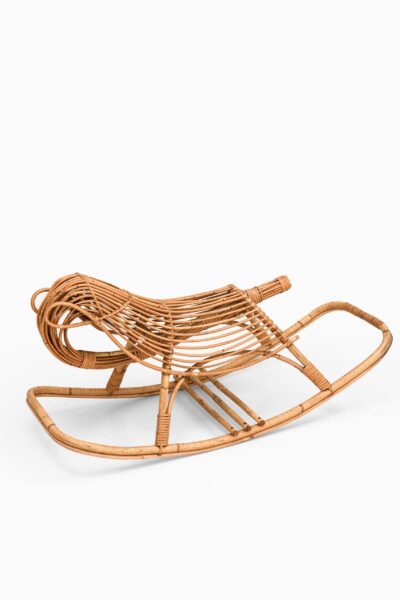 Rocking chair in rattan and cane for children at Studio Schalling
