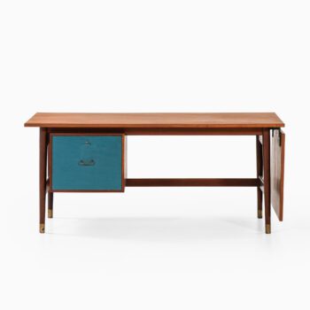 Desk in teak, brass and blue lacquer at Studio Schalling