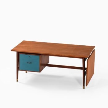 Desk in teak, brass and blue lacquer at Studio Schalling