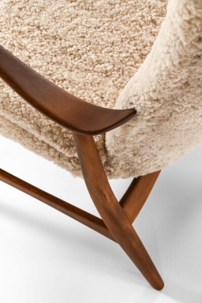 Easy chairs in beech and sheepskin at Studio Schalling