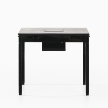 Game table in black lacquered wood at Studio Schalling