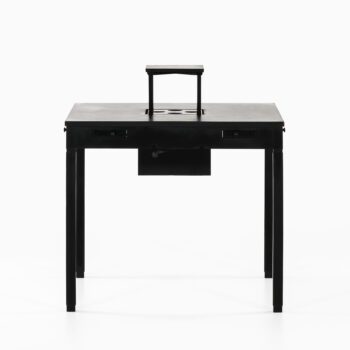 Game table in black lacquered wood at Studio Schalling