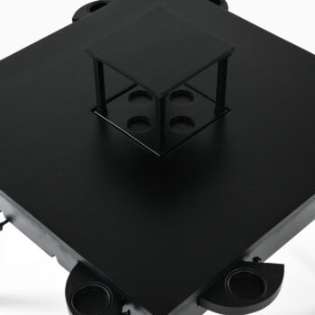 Game table in black lacquered wood at Studio Schalling