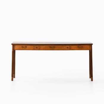 Console table in mahogany and brass at Studio Schalling