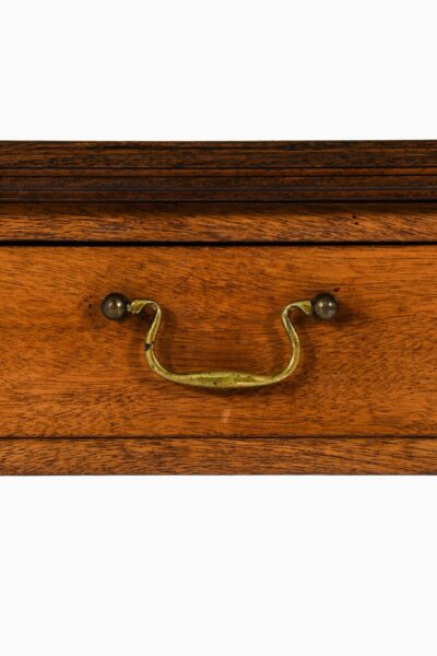 Console table in mahogany and brass at Studio Schalling