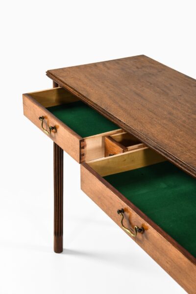 Console table in mahogany and brass at Studio Schalling