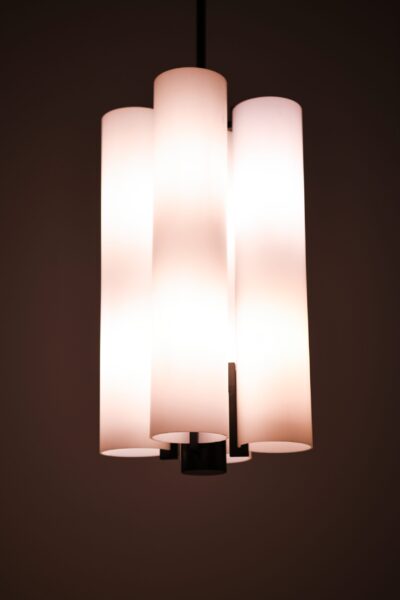Pair of large ceiling lamps in opaline glass at Studio Schalling