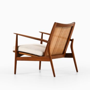 Ib Kofod-Larsen easy chair in teak at Studio Schalling