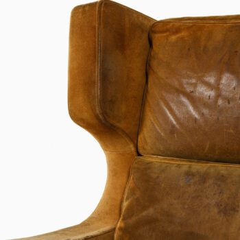 Rare wingback easy chair in suede at Studio Schalling
