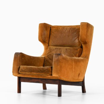 Rare wingback easy chair in suede at Studio Schalling