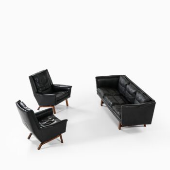 Sofa in rosewood and black leather at Studio Schalling