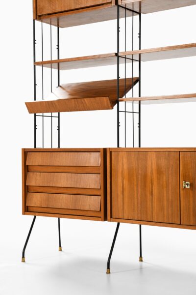Bookcase in walnut, brass and lacquered metal at Studio Schalling