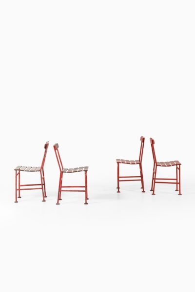 Gunnar Asplund chairs in red lacquered metal at Studio Schalling