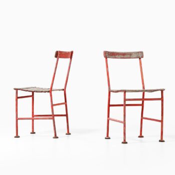 Gunnar Asplund chairs in red lacquered metal at Studio Schalling