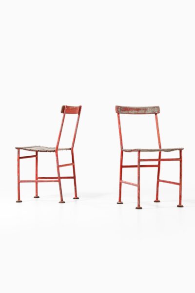 Gunnar Asplund chairs in red lacquered metal at Studio Schalling