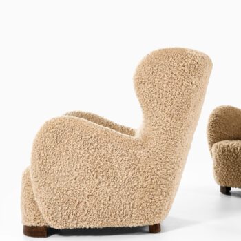 Pair of easy chairs in lambskin at Studio Schalling