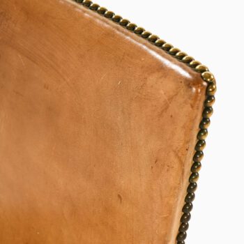 Dining chairs in walnut and leather at Studio Schalling