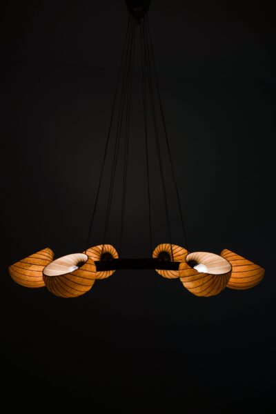 Hans Bergström ceiling lamp in teak at Studio Schalling