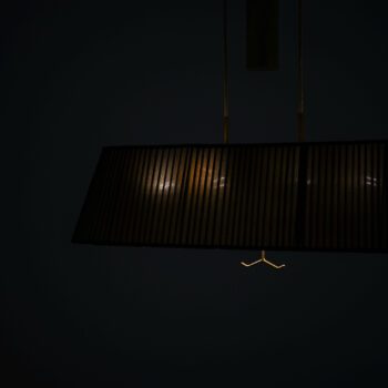 Height adjustable ceiling lamp by Böhlmarks at Studio Schalling