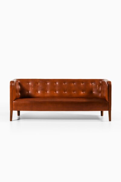 Jacob Kjær sofa in patinated leather at Studio Schalling