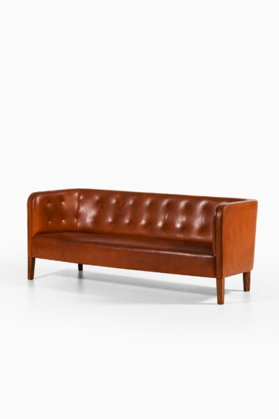 Jacob Kjær sofa in patinated leather at Studio Schalling