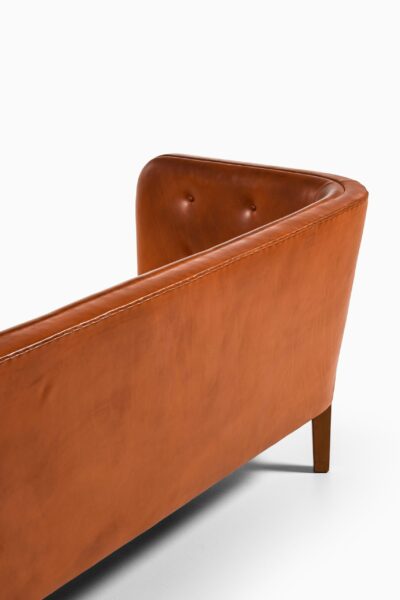 Jacob Kjær sofa in patinated leather at Studio Schalling