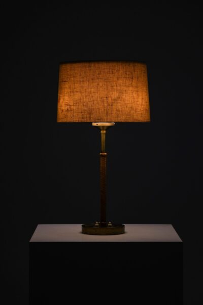 Bertil Brisborg table lamp in leather at Studio Schalling