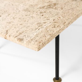 Coffee table with travertine top at Studio Schalling
