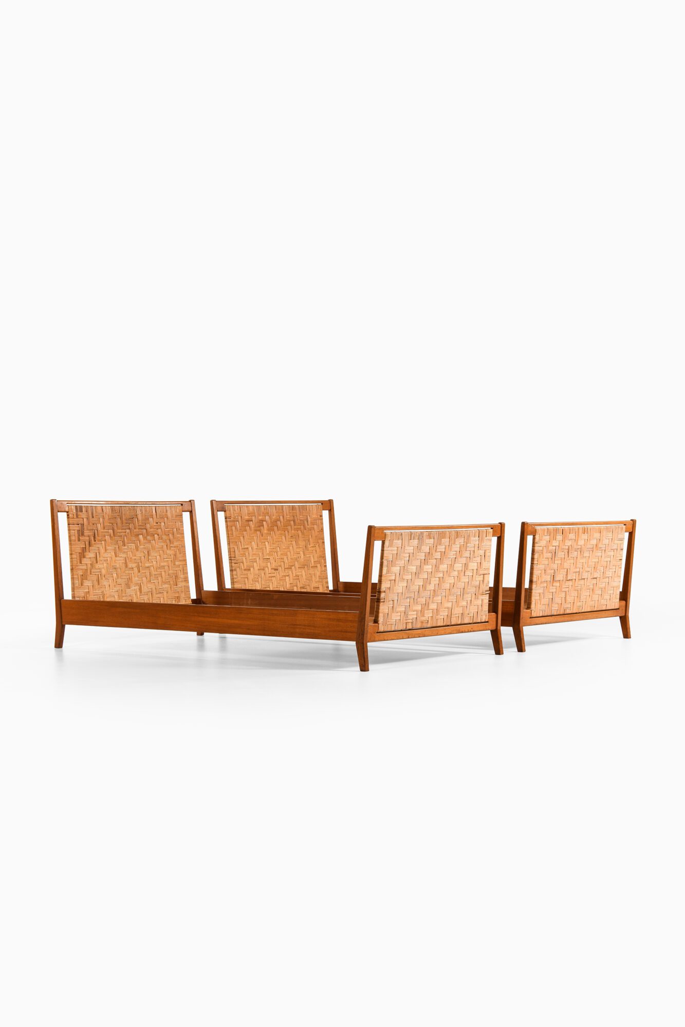 Josef Frank beds in mahogany and cane at Studio Schalling