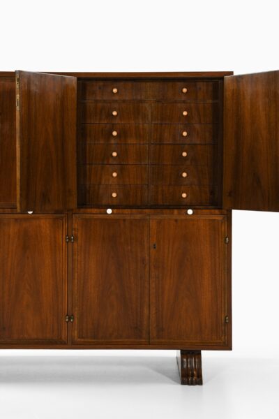 Bar cabinet in walnut and brass at Studio Schalling