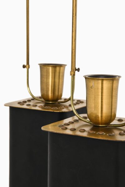 Pair of table lamps in brass and leather at Studio Schalling