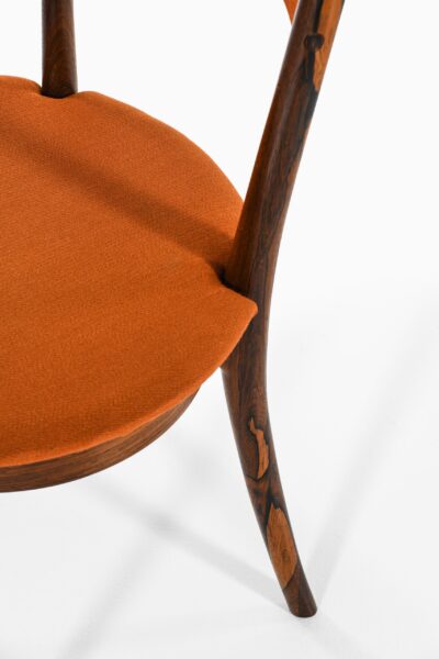 Dining chairs in rosewood and fabric at Studio Schalling