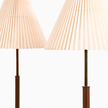 Philips floor lamps in brass and leather at Studio Schalling