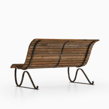Garden sofa in cast iron and wood at Studio Schalling