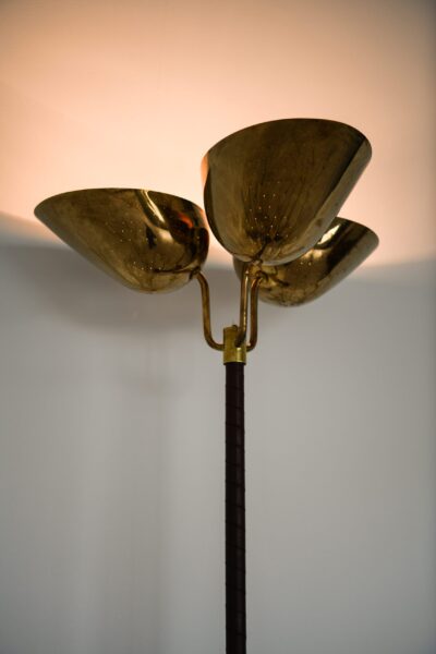 Carl-Axel Acking floor lamp in brass at Studio Schalling