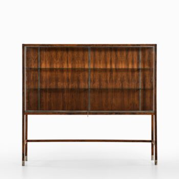 Display cabinet in rosewood, steel and glass at Studio Schalling