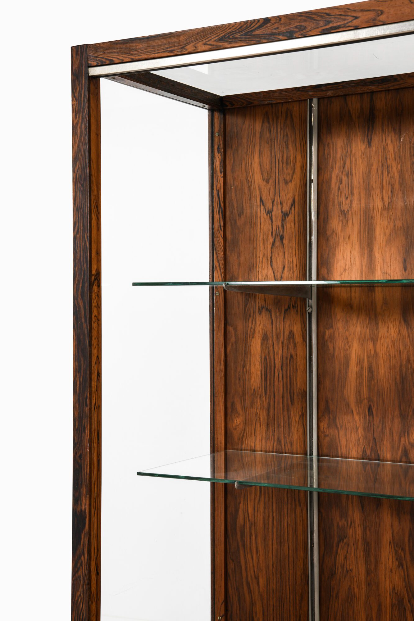 Display cabinet in rosewood, steel and glass at Studio Schalling