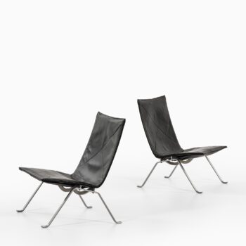 Poul Kjærholm PK-22 easy chairs in leather at Studio Schalling