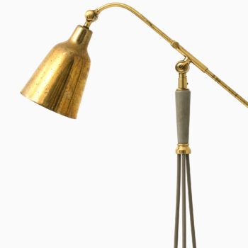 Floor lamp in lacquered metal and brass at Studio Schalling