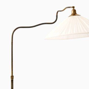 Adjustable floor lamp in brass at Studio Schalling