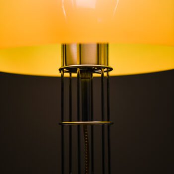 Table lamp in chromed steel and plastic at Studio Schalling
