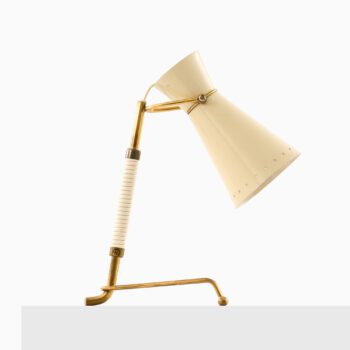 Table lamp in lacquered metal and brass at Studio Schalling