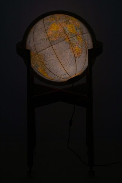 Globe on casters in walnut and brass at Studio Schalling