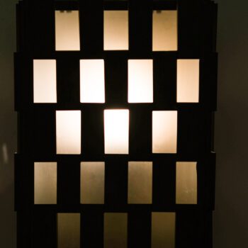Wall lamp in copper and frosted glass at Studio Schalling